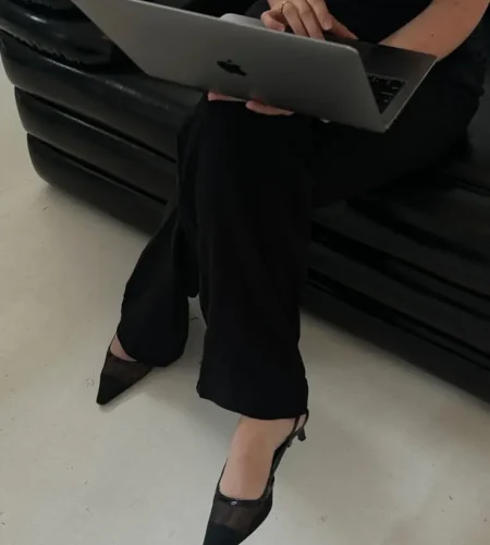 freelance digital marketing strategist in palakkad holding laptop